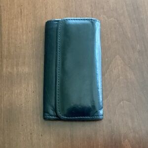 Coach smooth black leather trifold key case